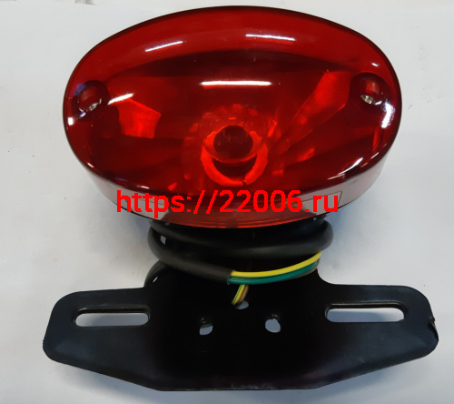 Фонарь задний стоп в сборе мопед Альфа тип 3 с кронштейном овальный Фонарь задний стоп в сборе мопед Альфа тип 3 с кронштейном овальный